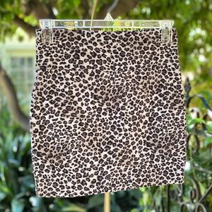 Stretchy snow leopard mini skirt